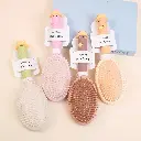 Lovely oval massage comb