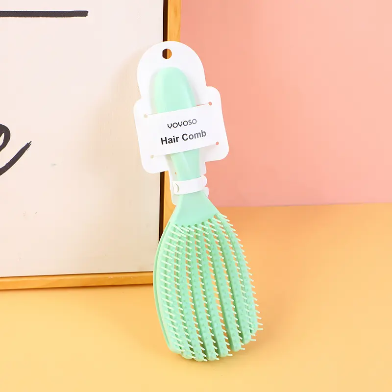 Shell shaped styling comb-green