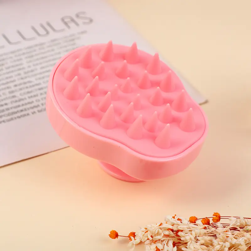 Pear-shaped shampoo brush