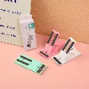 Portable desktop phone holder